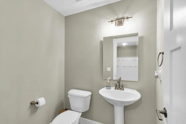 a bathroom with a sink and a toilet