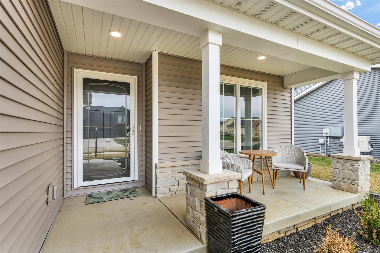 1403 Winterberry Road Savoy, IL 61874 - Photo 36 of 47 a balcony with furniture and wooden floor