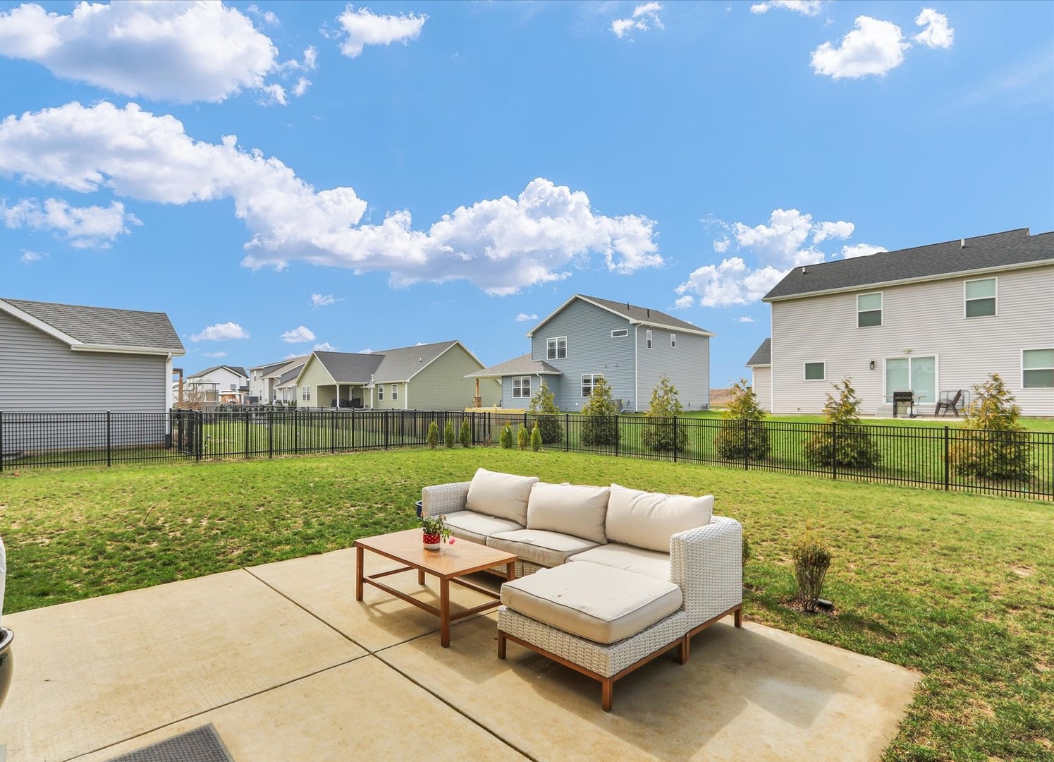 1403 Winterberry Road Savoy, IL 61874 - Photo 42 of 47 a view of a house with big yard and a patio