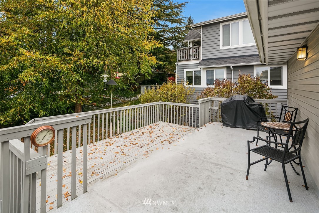 4216 Southwest Myrtle Street Seattle, WA 98136 - Photo 15 of 21 a view of a house with backyard and sitting area