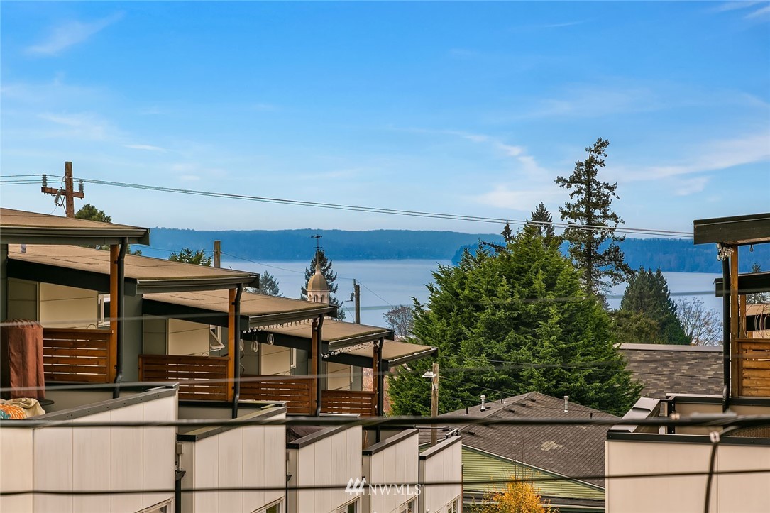 4216 Southwest Myrtle Street Seattle, WA 98136 - Photo 21 of 21 a view of a chairs and table on the terrace