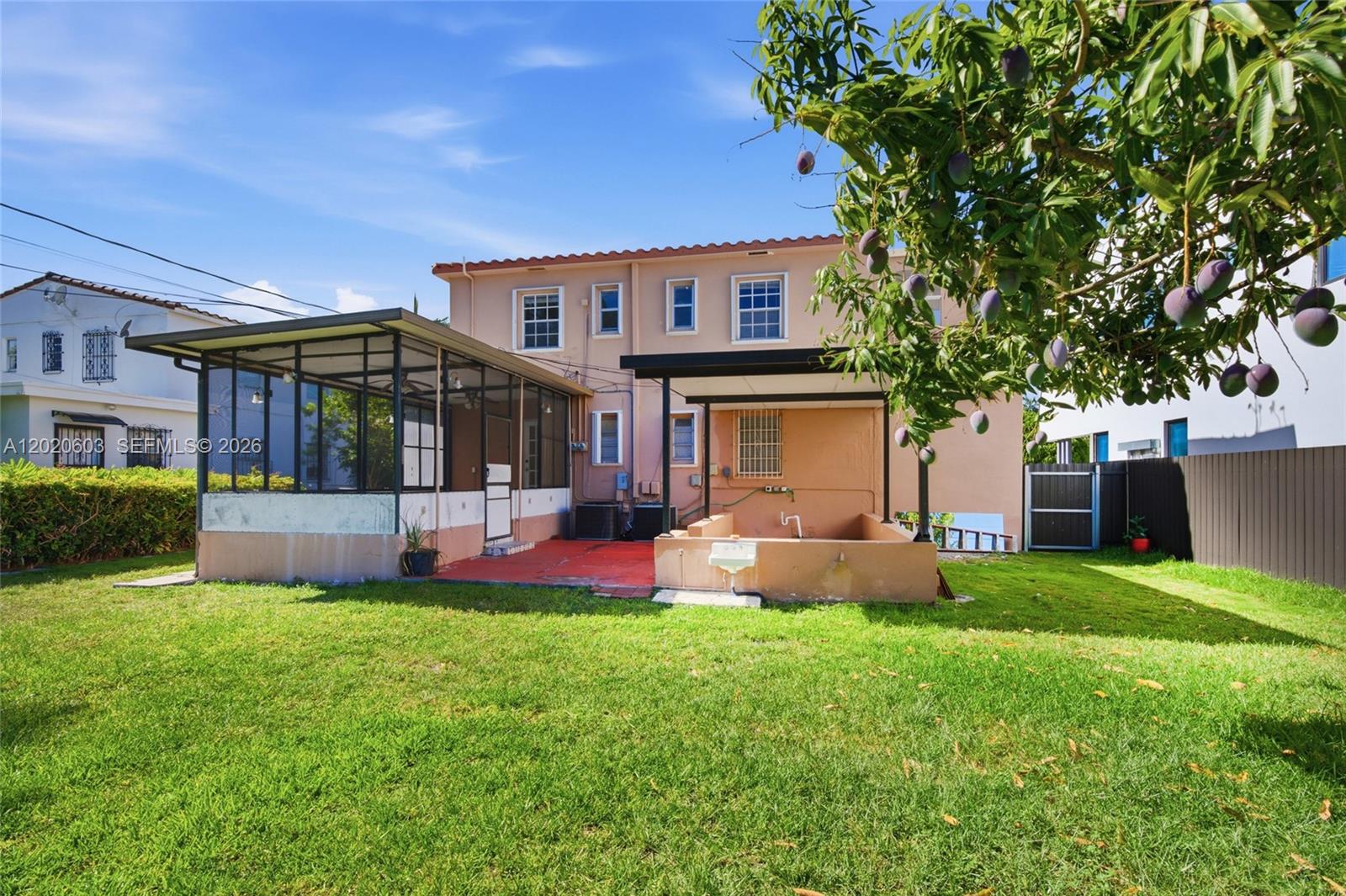 3750 Southwest 27th Street Miami, FL 33134 - Photo 33 of 41 front view of a house with a yard