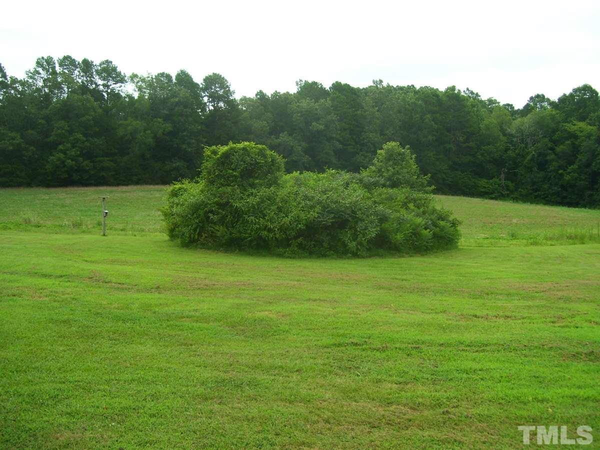 249 West O Painter Road Timberlake, NC 27583 - Photo 18 of 20 a big yard with lots of green space
