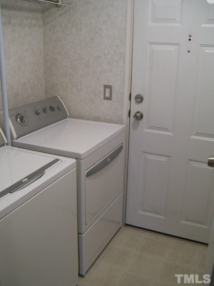 249 West O Painter Road Timberlake, NC 27583 - Photo 10 of 20 a utility room with dryer and washer