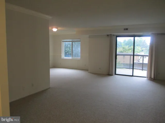 a view of a livingroom with a flat screen tv