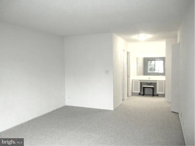 a bathroom with a tub and a shower