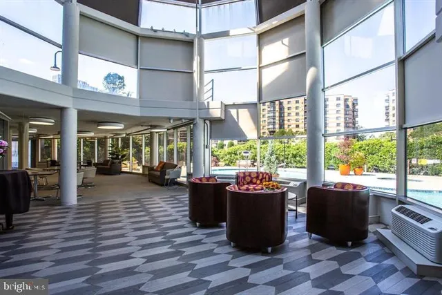 a view of a swimming pool with a garden