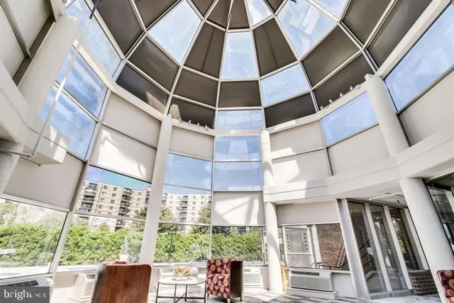 a view of a living room and bathroom
