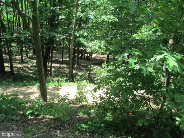 a balcony with wooden floor