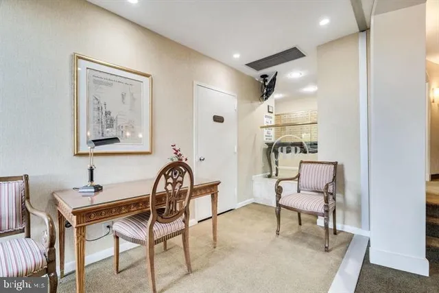 a kitchen with a refrigerator and a stove