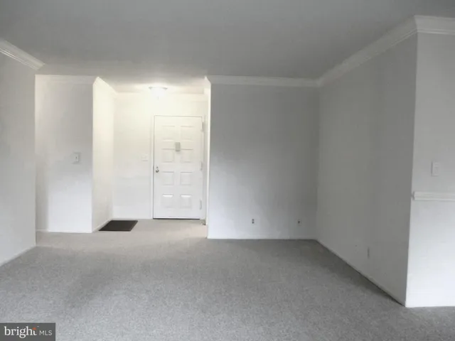 a kitchen with granite countertop cabinets stainless steel appliances and sink