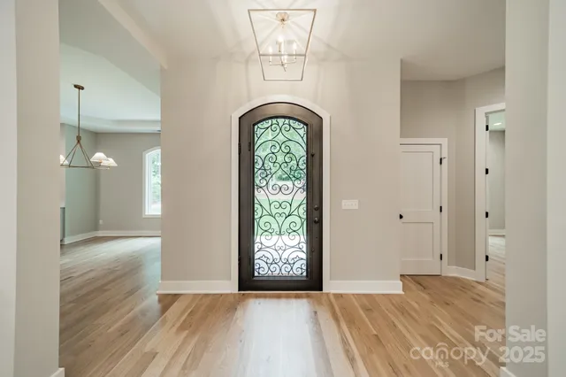 a bathroom with a sink a shower and a mirror