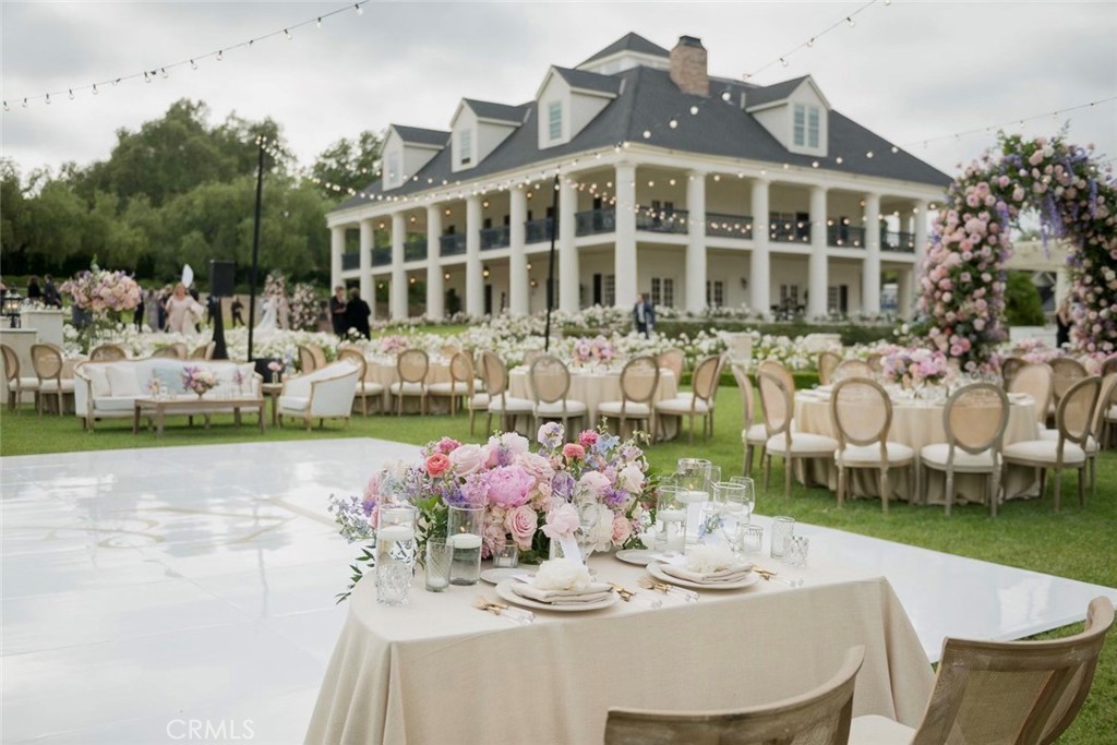 85 Crestview Avenue Camarillo, CA 93010 - Photo 15 of 62 a view of a patio with table and chairs and potted plants