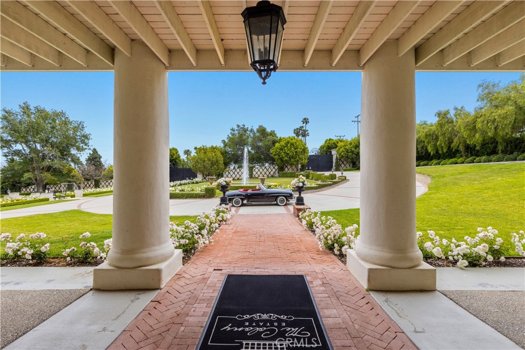 85 Crestview Avenue Camarillo, CA 93010 - Photo 22 of 62 a view of a patio with table and chairs potted plants