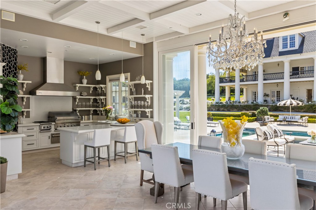 85 Crestview Avenue Camarillo, CA 93010 - Photo 31 of 62 a view of a dining room with furniture and chandelier
