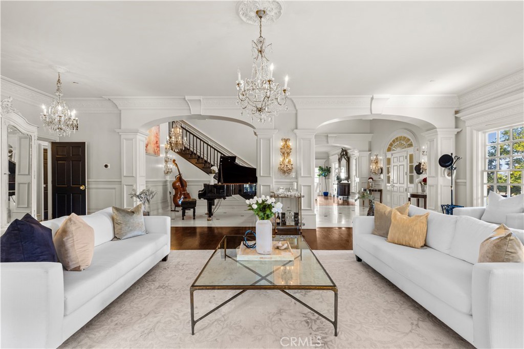 85 Crestview Avenue Camarillo, CA 93010 - Photo 37 of 62 a living room with fireplace furniture and a chandelier