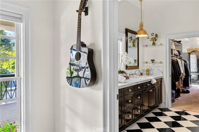 a view of a living room and balcony