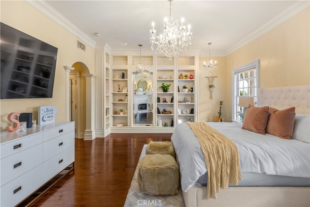 85 Crestview Avenue Camarillo, CA 93010 - Photo 47 of 62 a spacious bedroom with a bed and wooden floor