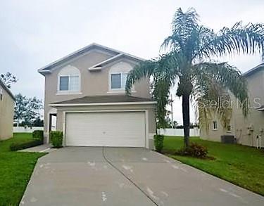 12920 Fennway Ridge Drive Riverview, FL 33579 - Photo 1 of 1 a front view of house with a garden