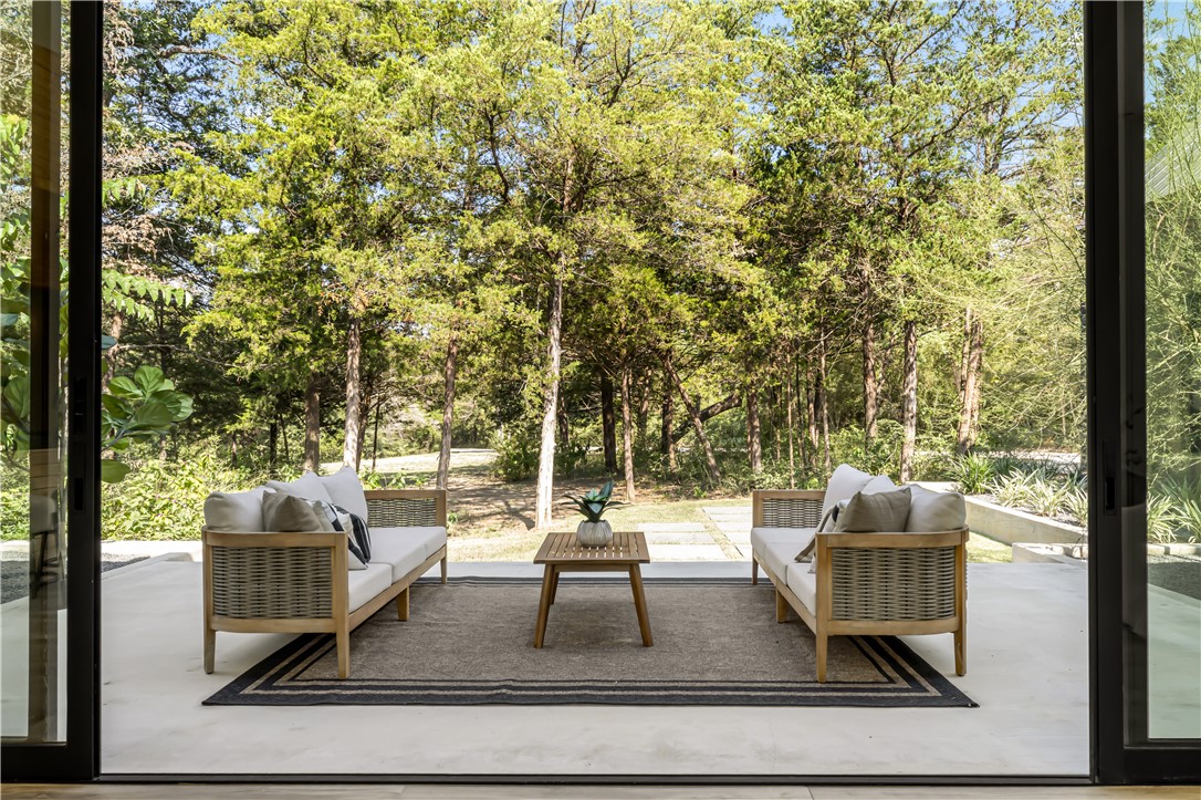 11851 Hopes Creek Road College Station, TX 77845 - Photo 14 of 50 a living room with couch and a floor to ceiling window