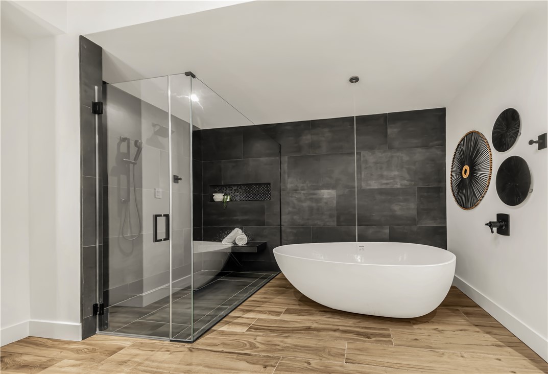 11851 Hopes Creek Road College Station, TX 77845 - Photo 25 of 50 a bathroom with a bathtub and shower