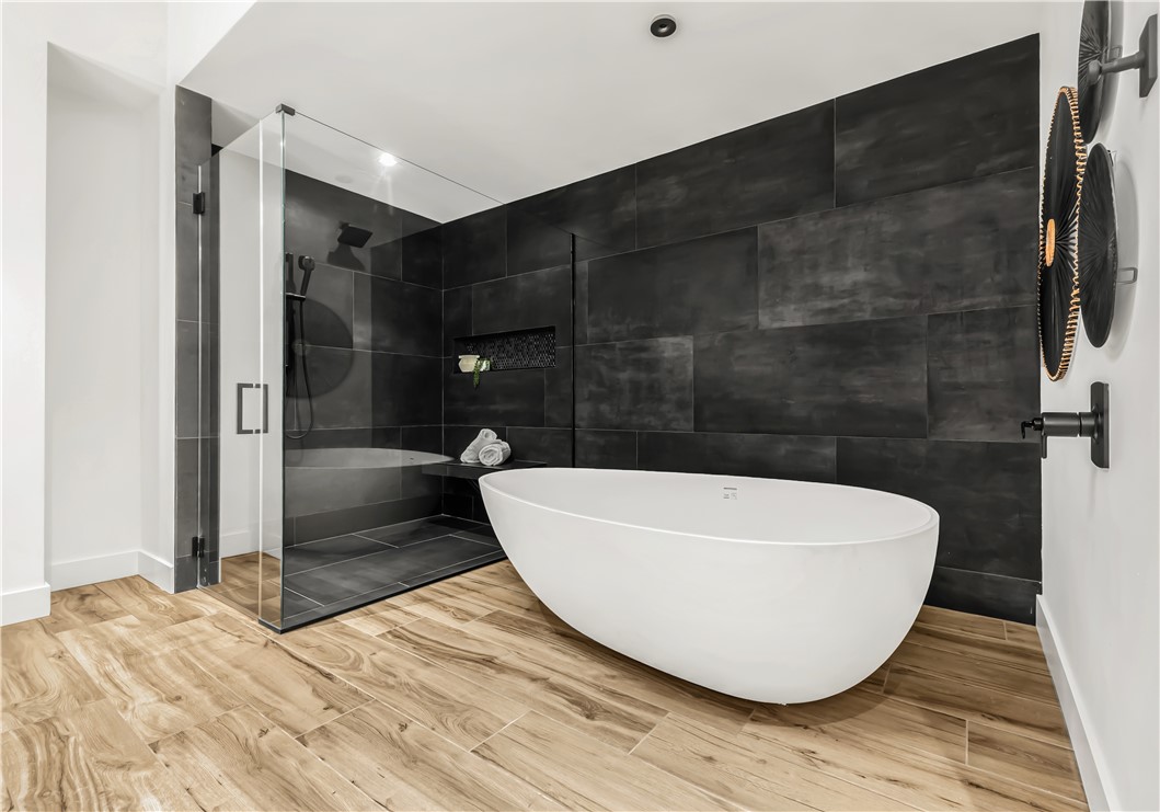 11851 Hopes Creek Road College Station, TX 77845 - Photo 26 of 50 a bathroom with a bathtub and shower