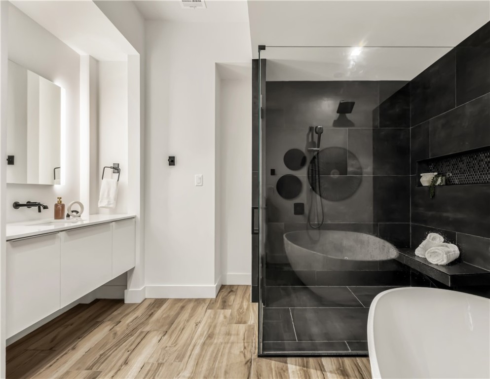 11851 Hopes Creek Road College Station, TX 77845 - Photo 27 of 50 a bathroom with a sink mirror and toilet
