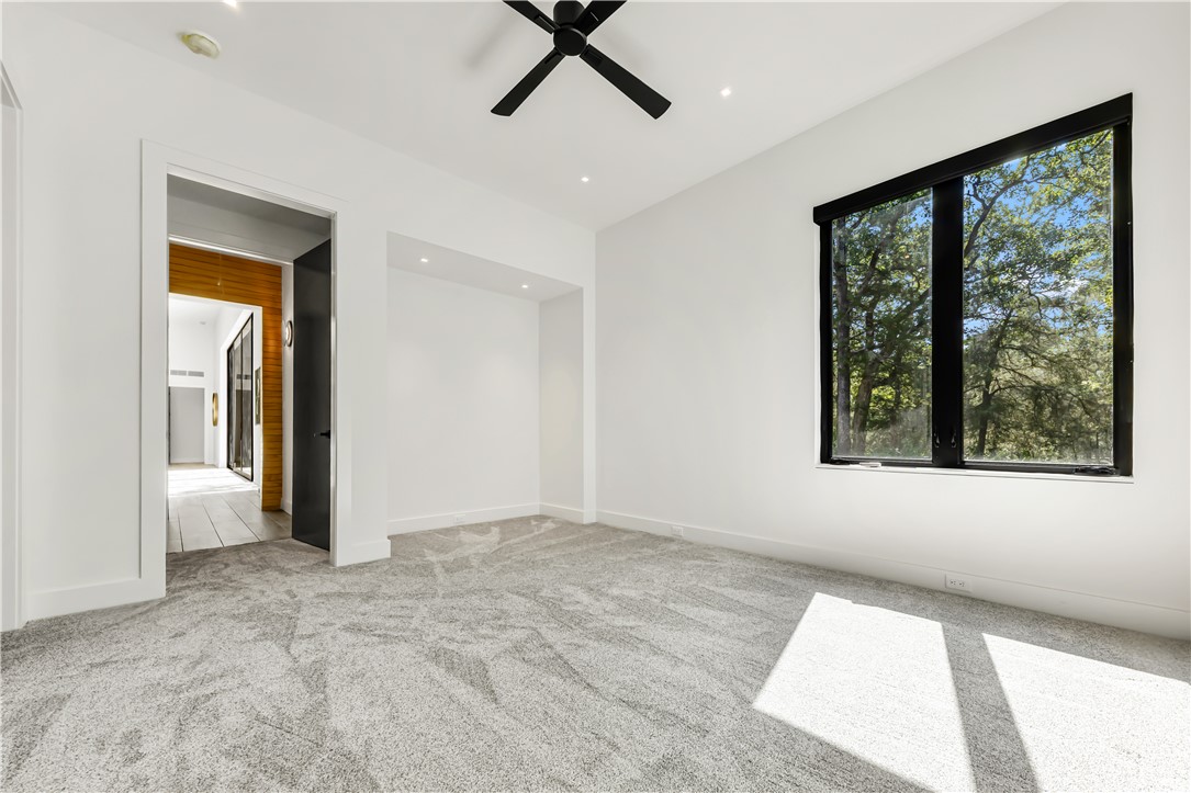 11851 Hopes Creek Road College Station, TX 77845 - Photo 38 of 50 a view of an empty room with a window