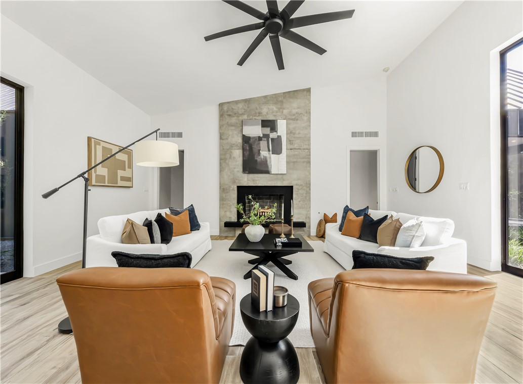 11851 Hopes Creek Road College Station, TX 77845 - Photo 8 of 50 a living room with furniture a fireplace and wooden floor