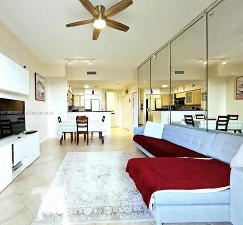 a kitchen with a sink stove top oven and microwave