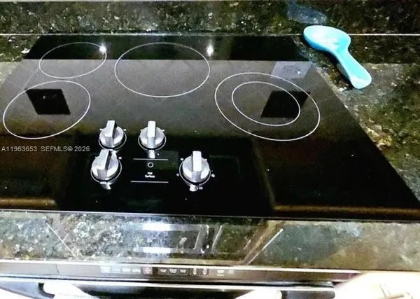 a bedroom with two beds and a window