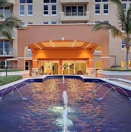a view of a house with a swimming pool