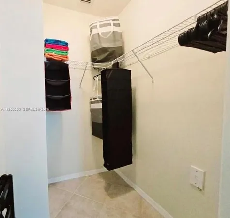 a bathroom with a sink toilet and mirror