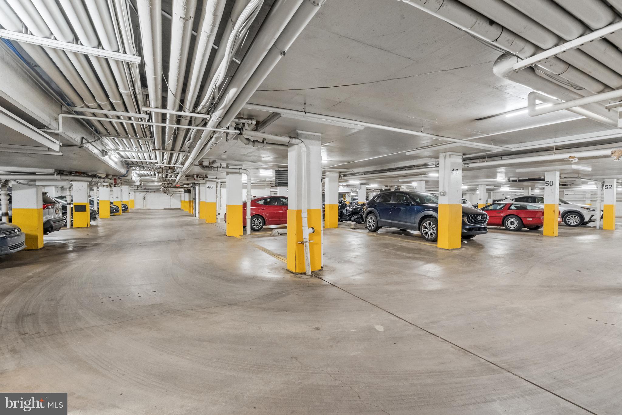 950 25th Street Northwest, Unit 717 Washington, DC 20037 - Photo 13 of 19 a view of parking garage with cars