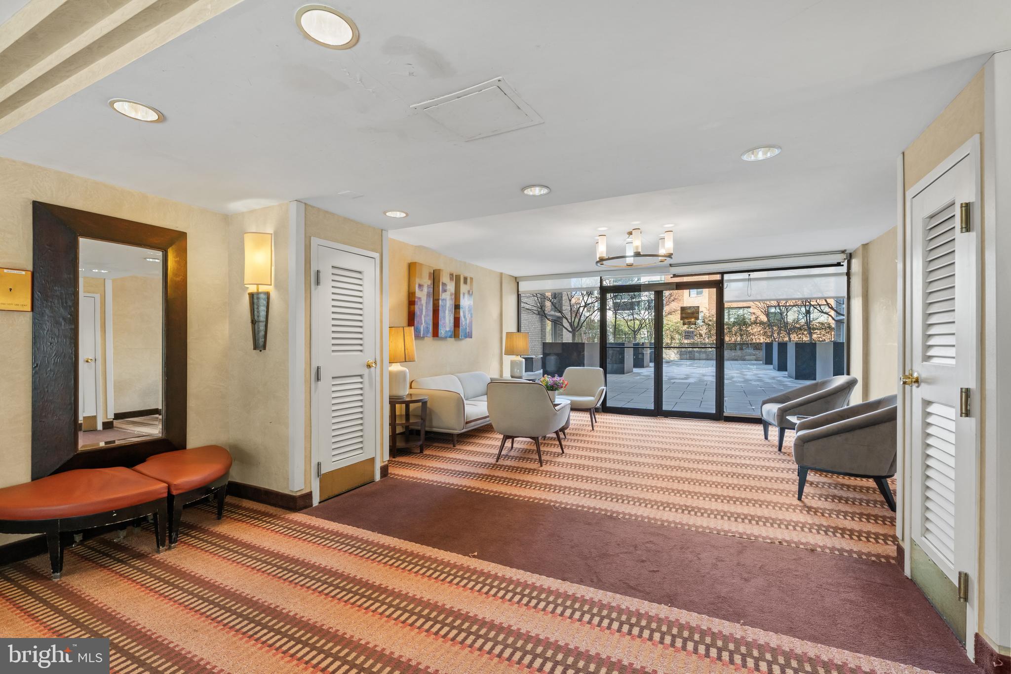 950 25th Street Northwest, Unit 717 Washington, DC 20037 - Photo 15 of 19 a living room with furniture and a rug