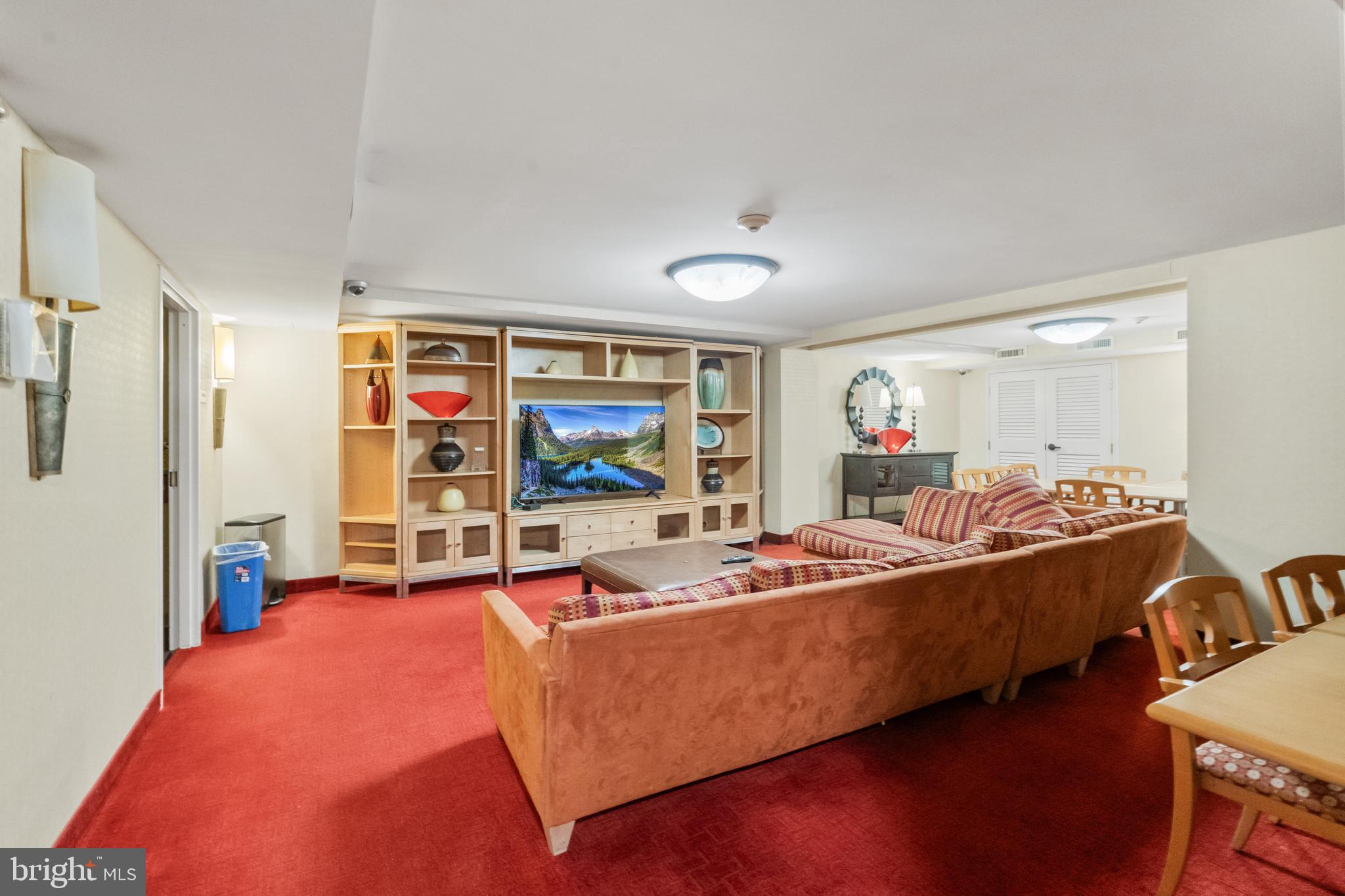 950 25th Street Northwest, Unit 717 Washington, DC 20037 - Photo 17 of 19 a living room with furniture and a flat screen tv
