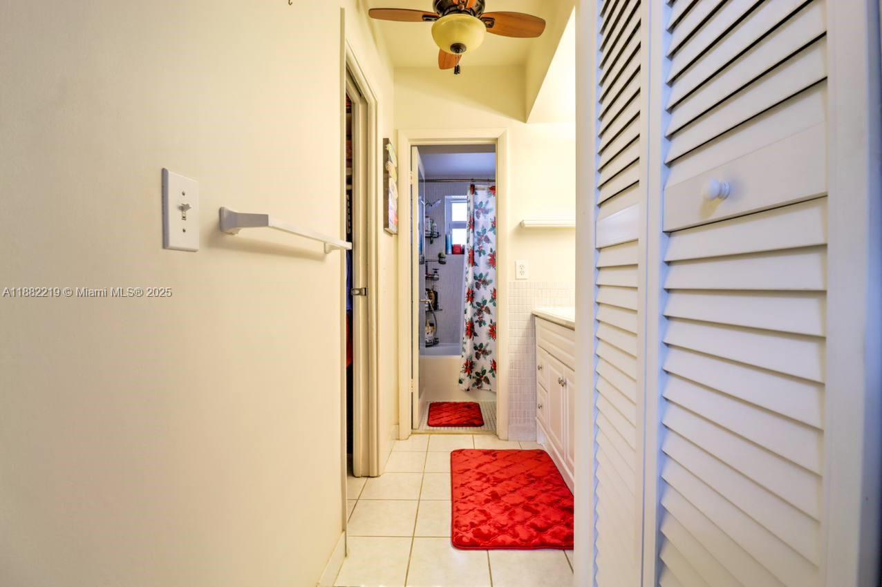 850 Northeast 12th Avenue, Unit 210 Hallandale Beach, FL 33009 - Photo 14 of 16 a view of a hallway with painted walls