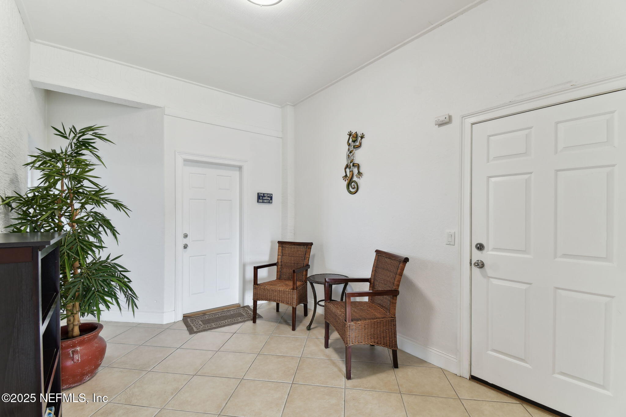 8961 A1A South St. Augustine, FL 32080 - Photo 12 of 62 a view of a livingroom with furniture and a potted plant