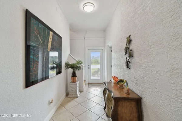 a bathroom with a toilet a sink and a mirror
