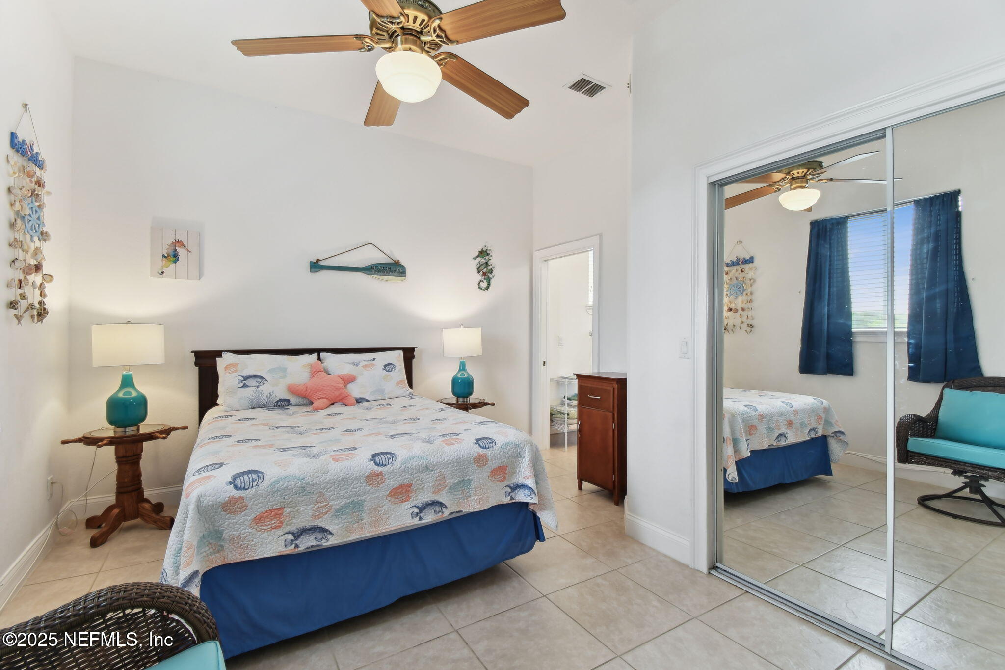 8961 A1A South St. Augustine, FL 32080 - Photo 15 of 62 a bedroom with a bed and dresser