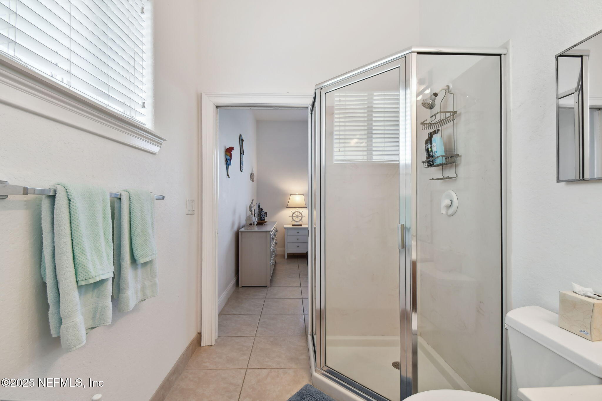 8961 A1A South St. Augustine, FL 32080 - Photo 18 of 62 a bathroom with a shower and a sink