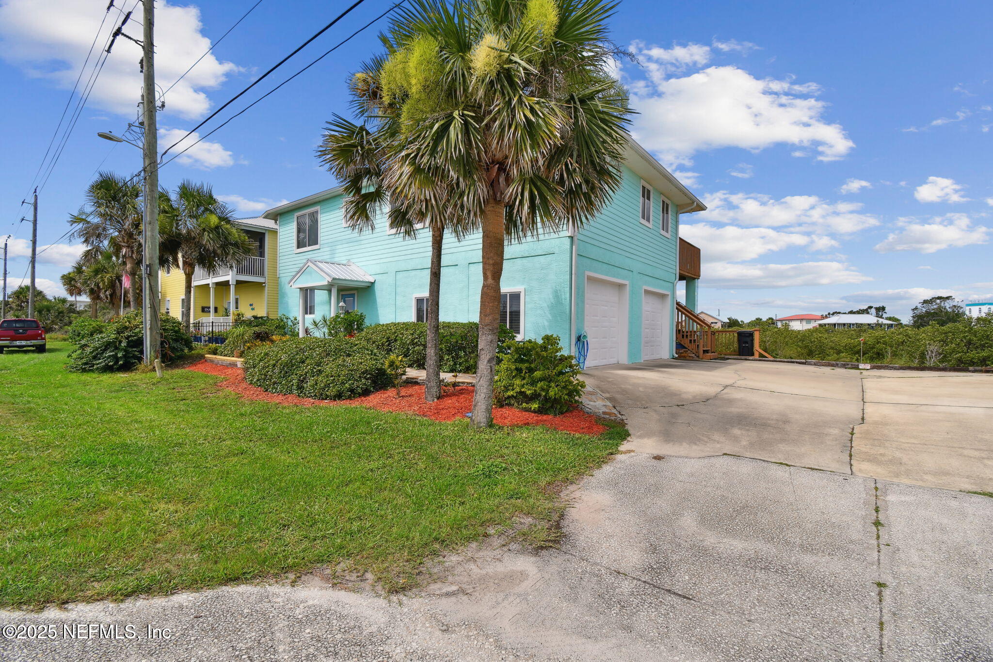 8961 A1A South St. Augustine, FL 32080 - Photo 2 of 62 a front view of house with yard and green space