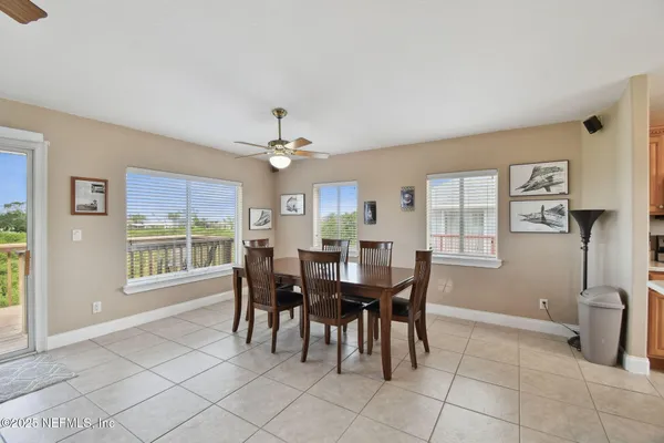 a bedroom with a bed and a flat tv screen