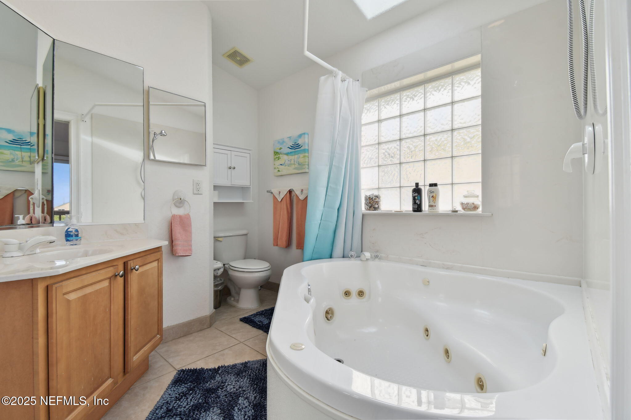 8961 A1A South St. Augustine, FL 32080 - Photo 39 of 62 a bathroom with a bathtub and a sink