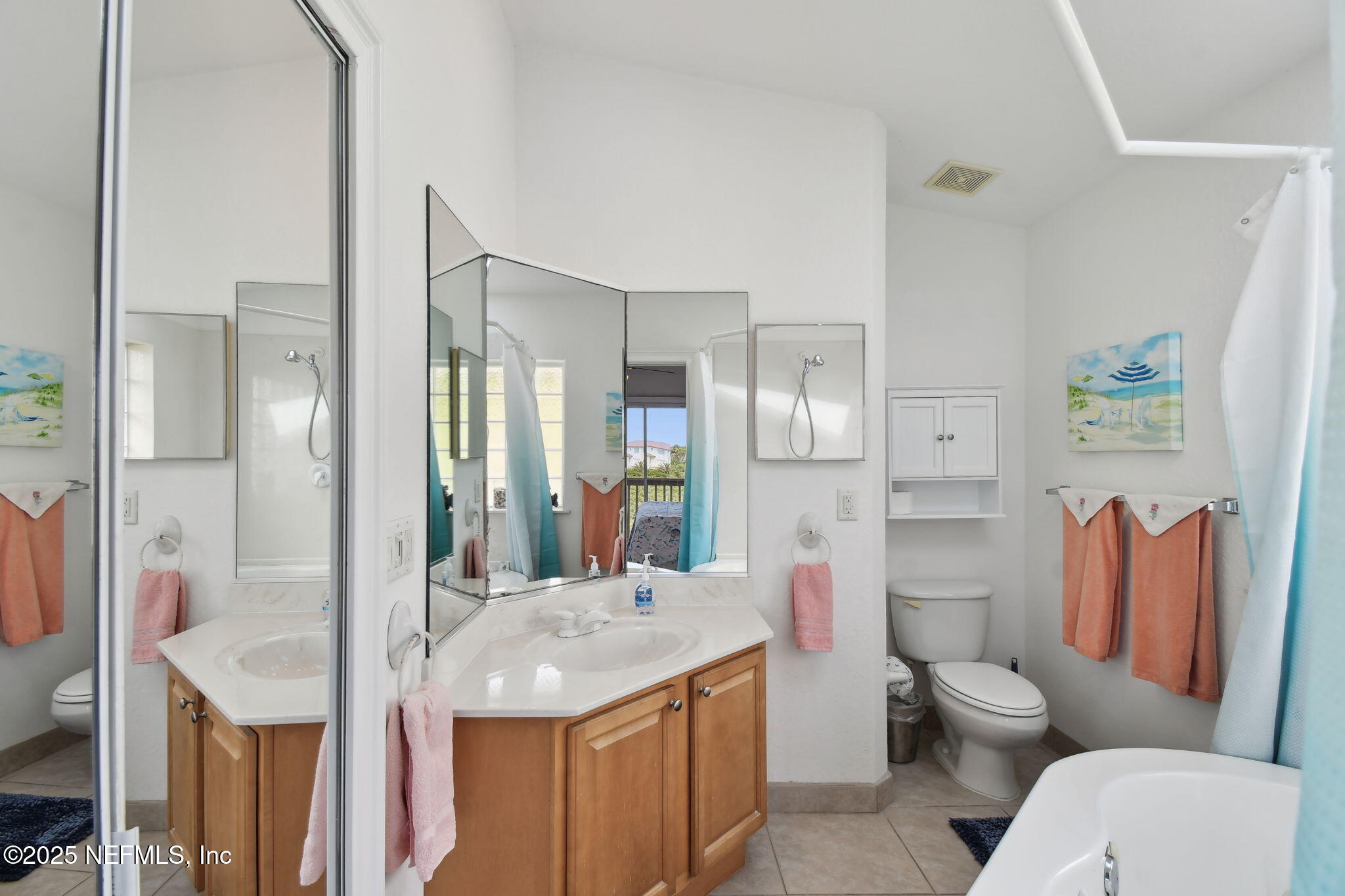 8961 A1A South St. Augustine, FL 32080 - Photo 40 of 62 a bathroom with a granite countertop sink and a mirror