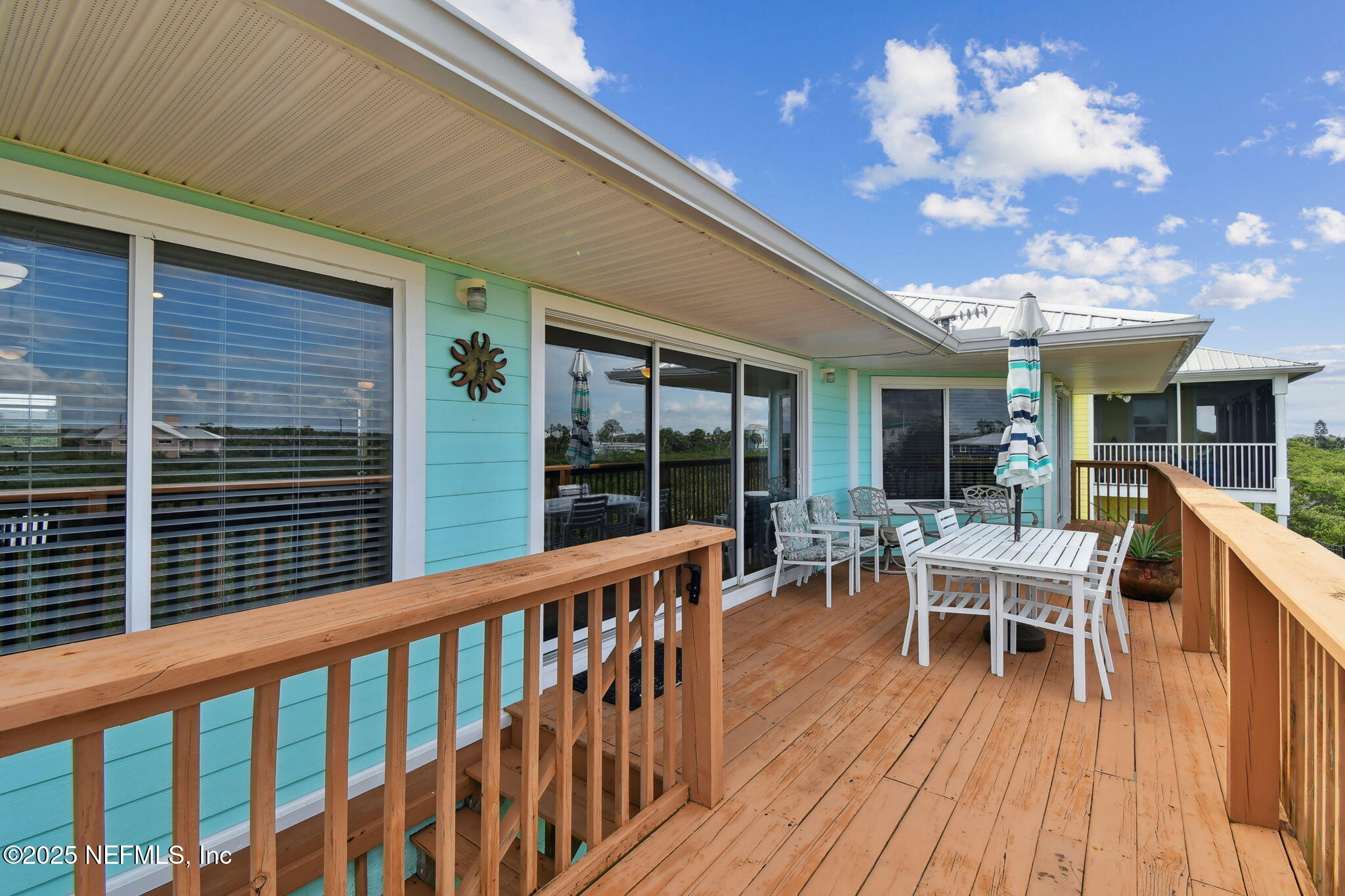 8961 A1A South St. Augustine, FL 32080 - Photo 48 of 62 a view of a two chairs and table in the balcony