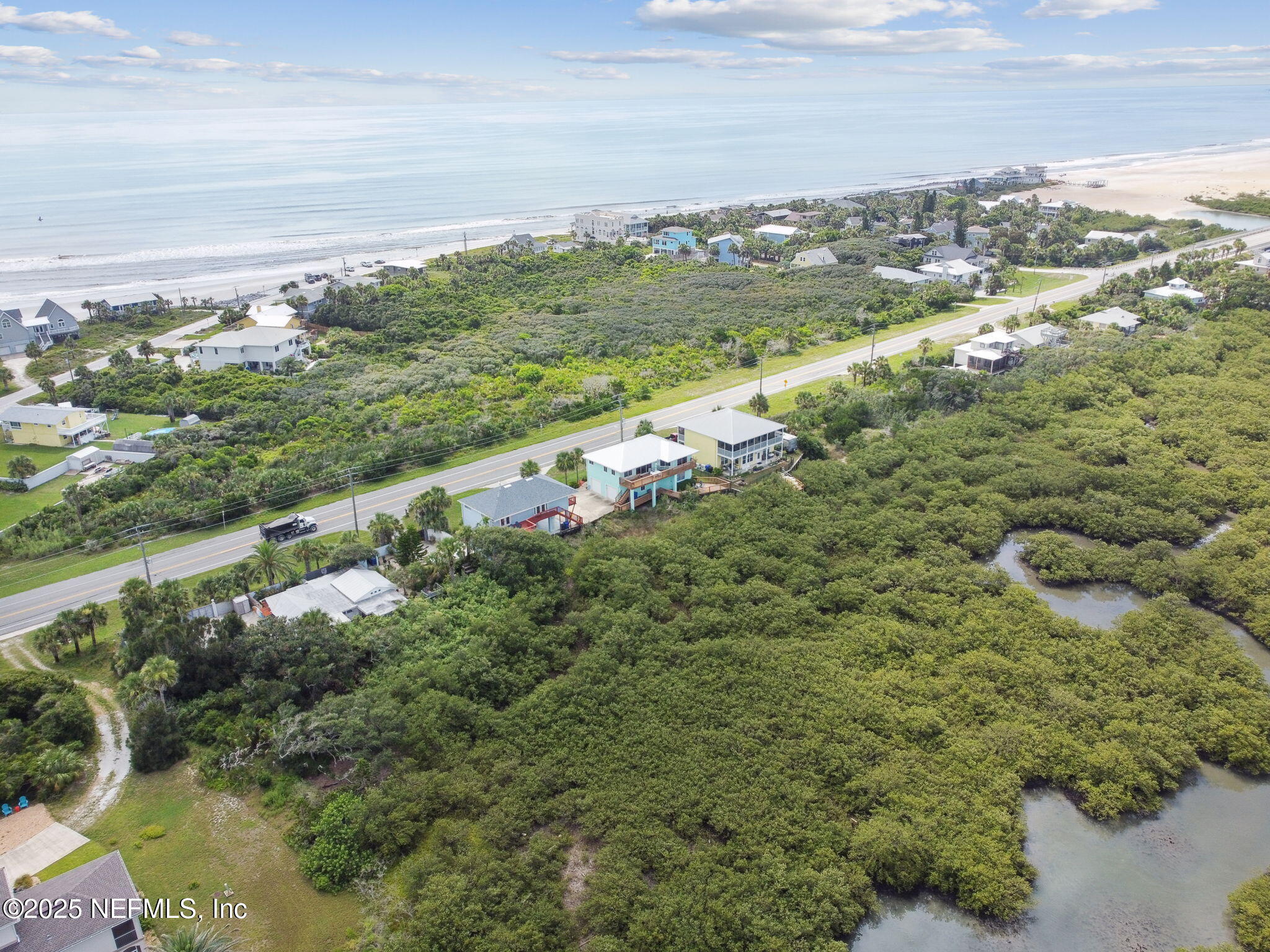 8961 A1A South St. Augustine, FL 32080 - Photo 57 of 62 a view of a field with an ocean