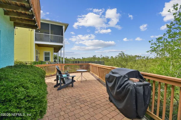 a bedroom with a bed and dresser