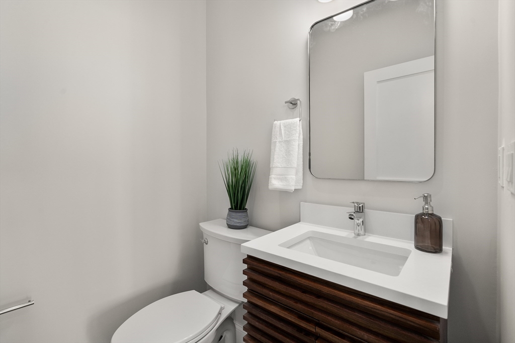 48 Hamilton Road Belmont, MA 02478 - Photo 17 of 35 a bathroom with a sink toilet and mirror