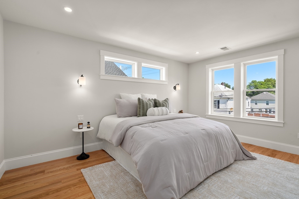 48 Hamilton Road Belmont, MA 02478 - Photo 19 of 35 a bedroom with a bed and a window